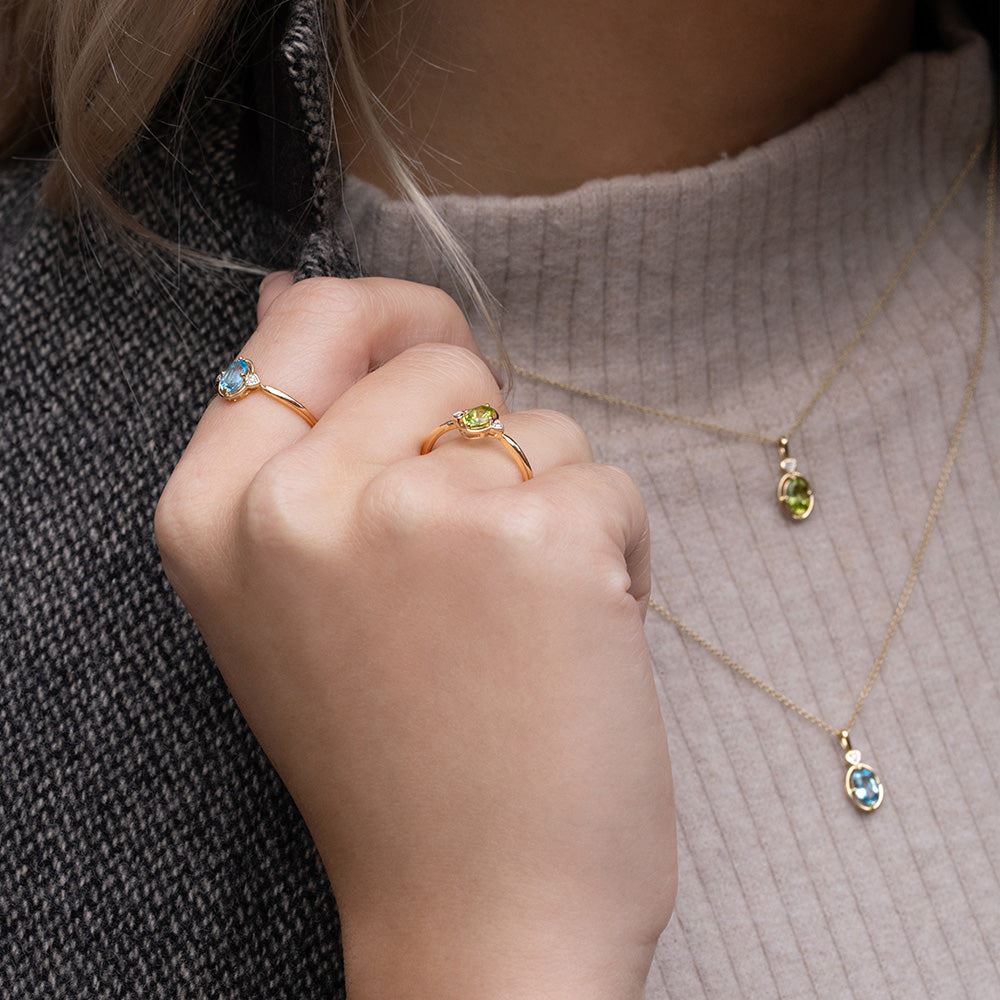 Classic Oval Peridot & Diamond Heart Ring In 9ct Yellow Gold