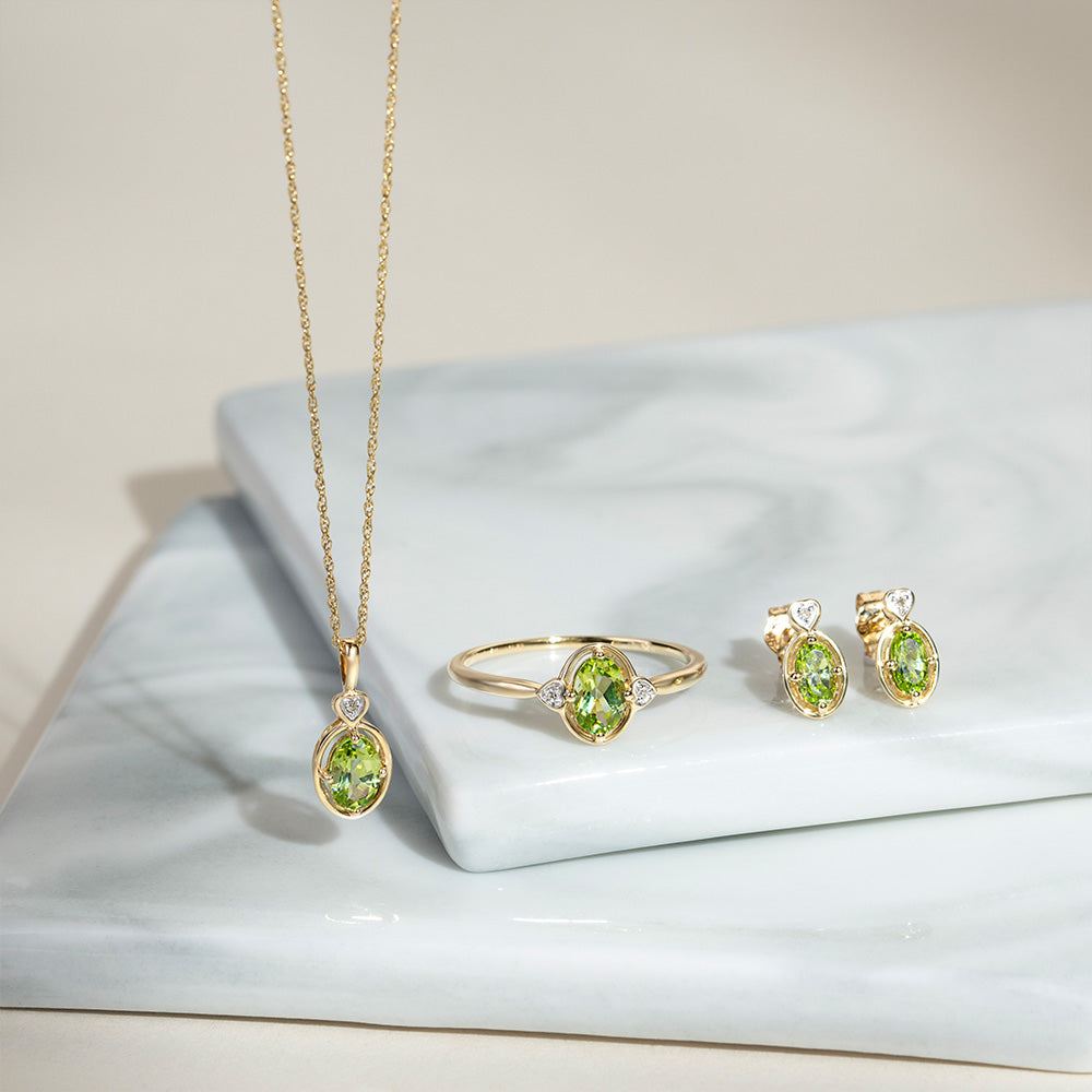 classic-oval-peridot-diamond-heart-stud-earrings-in-9ct-yellow-gold-135e1911039 Flatlay