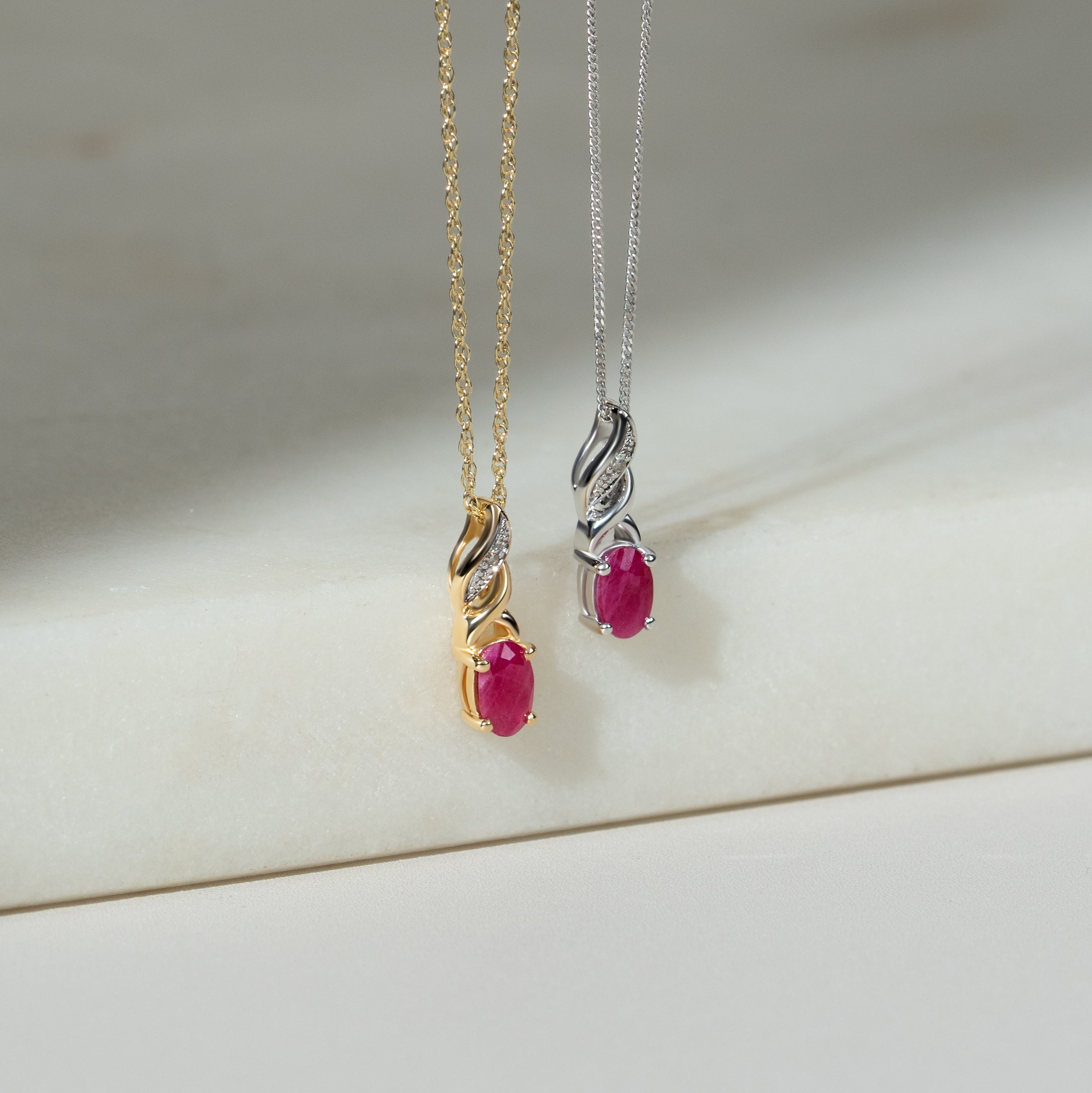 Classic Oval Ruby & Diamond Twist Pendant in 9ct Yellow Gold