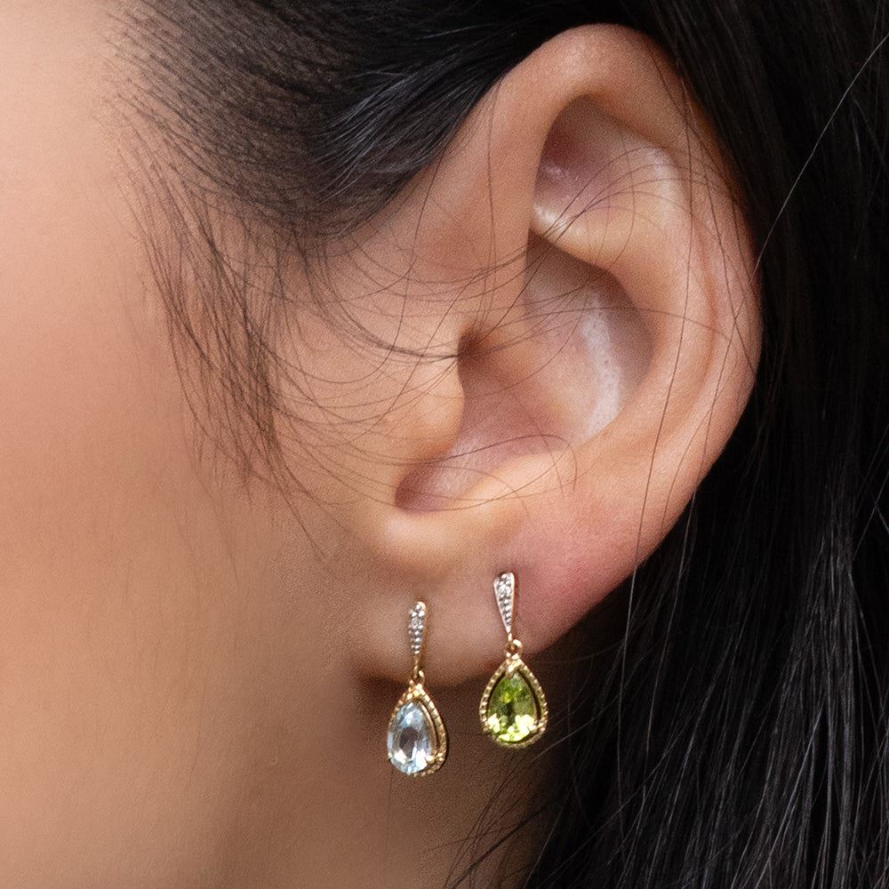 classic-pear-peridot-diamond-drop-earrings-in-9ct-yellow-gold-135e1912039 on Model